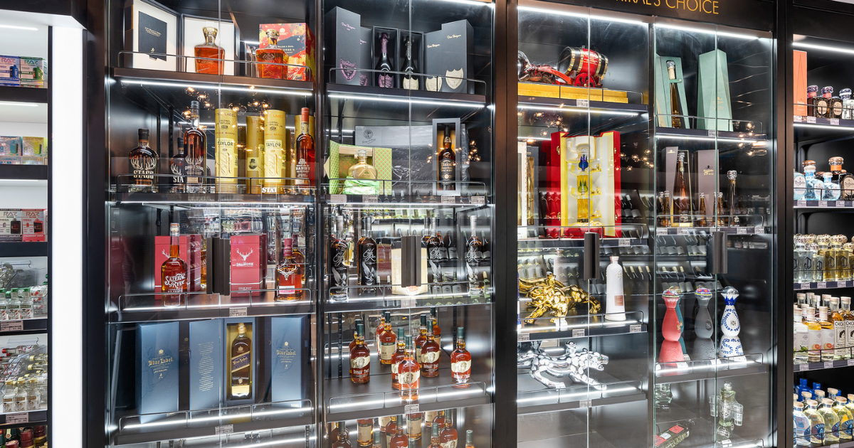 Glass display showcasing rare bourbons, luxury tequila, and premium whiskey bottles at Ormond Liquor in Ormond Beach Florida